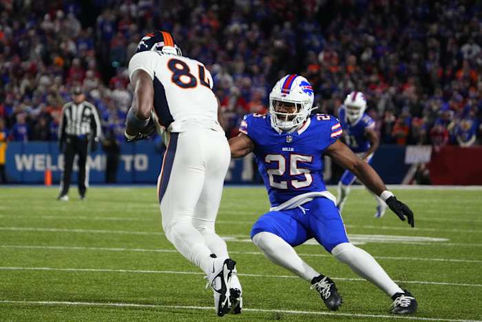 Denver Broncos tight end Chris Manhertz (84) makes a catch against Buffalo Bills linebacker Tyrel Dodson (25) during the first half at Highmark Stadium.